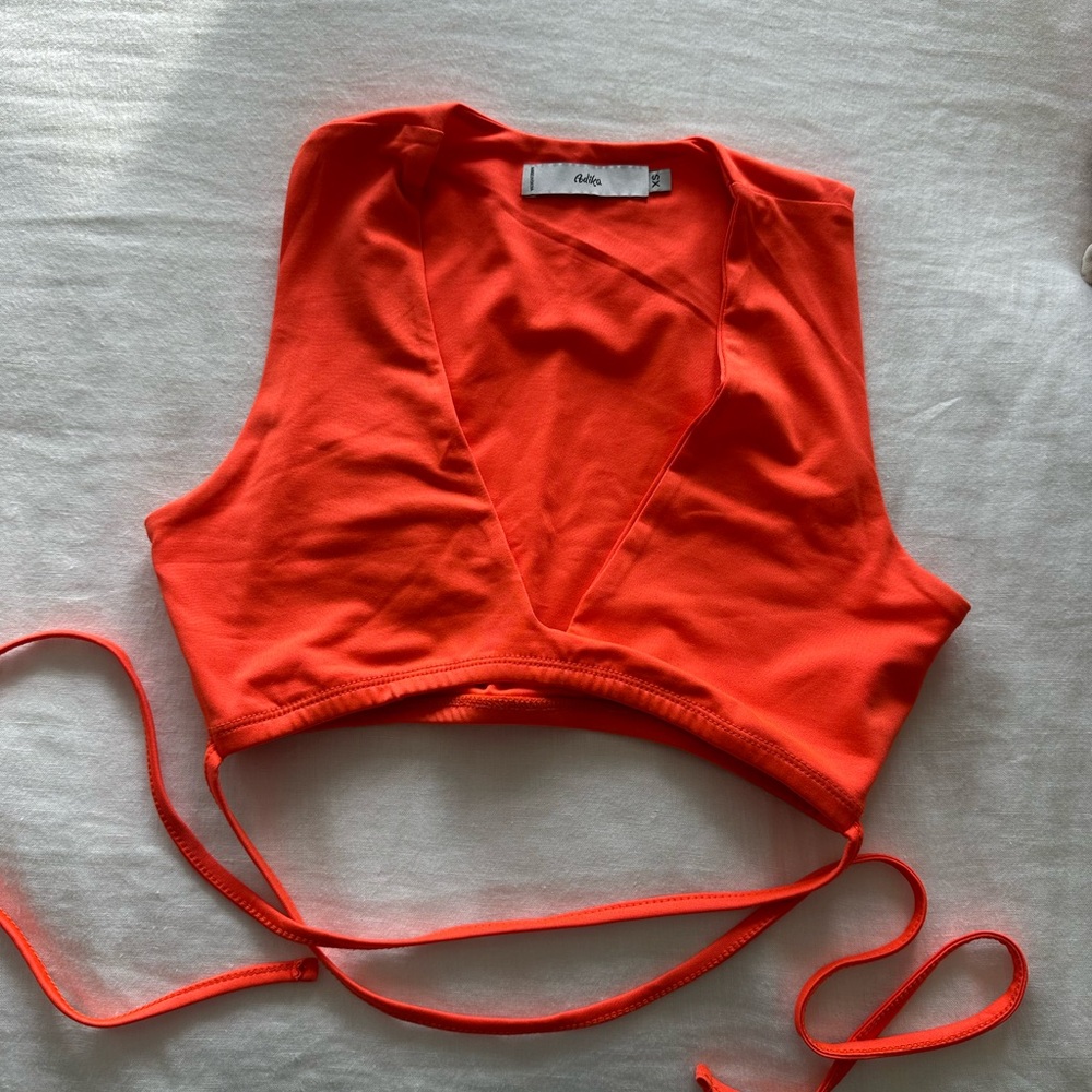 Bright orange wrap crop top